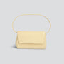 Ikon Clutch - autruche jaune beurre