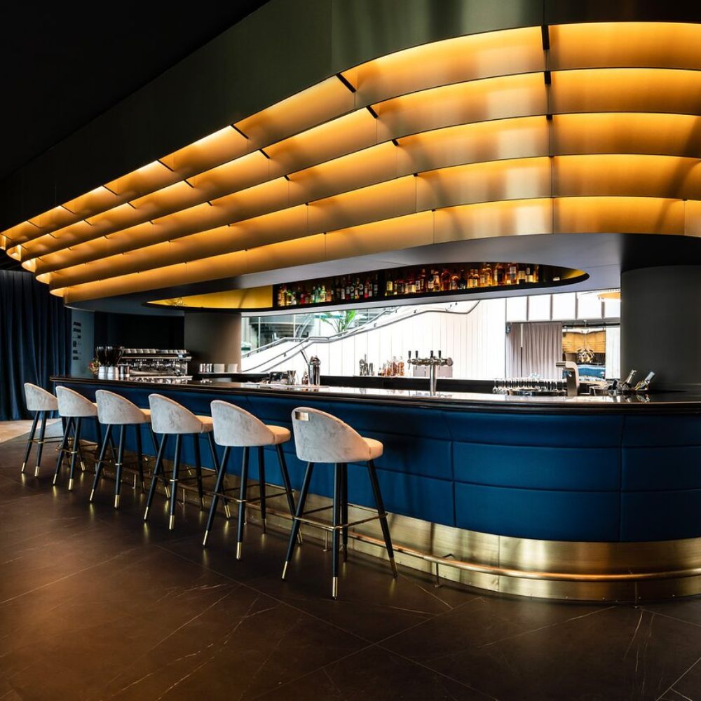 Meet us for a free drink at the bar of the Radisson Collection Hotel in Brussels